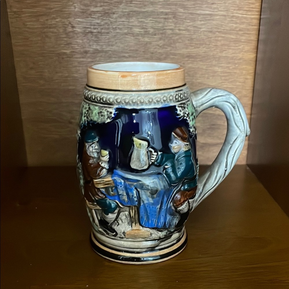 Vintage Ceramic Beer Stein with Blue and Brown Design